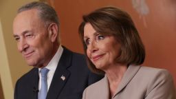 Speaker of the House Nancy Pelosi (D-CA) and Senate Minority Leader Charles Schumer (D-NY) pose for photographs after delivering a televised response to President Donald Trump's national address about border security at the U.S. Capitol January 08, 2019 in Washington, DC. (Chip Somodevilla/Getty Images)
