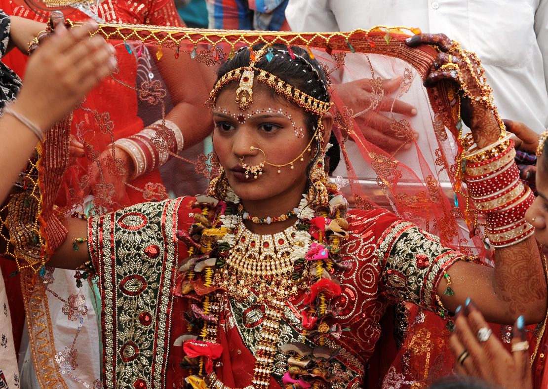 A Rajasthani woman takes part in a mass wedding ceremony during "Akshaya Tritiya" festivities in Ahmedabad.
