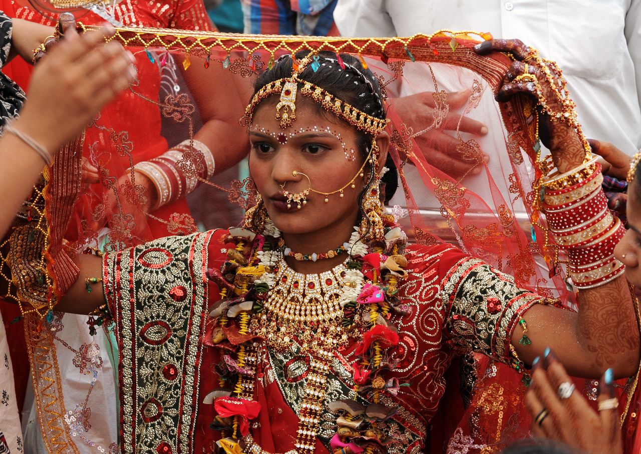 A Rajasthani woman takes part in a mass wedding ceremony during Akshaya Tritiya, an annual festival.