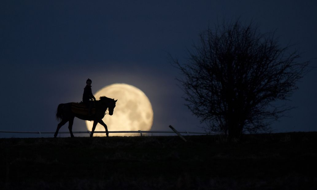 Multi award-winning snapper Edward Whitaker earned horse racing's photograph of the year award with this stunning image of a rare blue supermoon in Lambourn, Berkshire in January 2018. "I knew a spot where the angle was just right," he says. Here he talks CNN Sport through seven of his favorite images.     