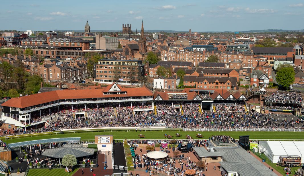 Whitaker conquered his fears and rode up in the TV crane to capture this image of the city of Chester and the racecourse. "This is the scariest picture I've ever taken.  You go up on this wobbly plank with a safety harness clipped to a metal frame. I was absolutely terrified but the view was amazing, the light was just right and I got this great scene of Chester with the action on the racecourse."