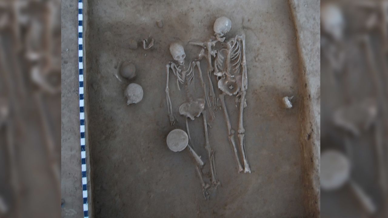 The man and woman died and were buried together -- but what killed them?
