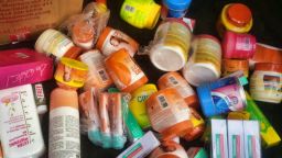 Photos of confiscated cosmetics seized from markets in Rwanda. The government started a campaign against skin bleaching and substandard cosmetics in November 2018.