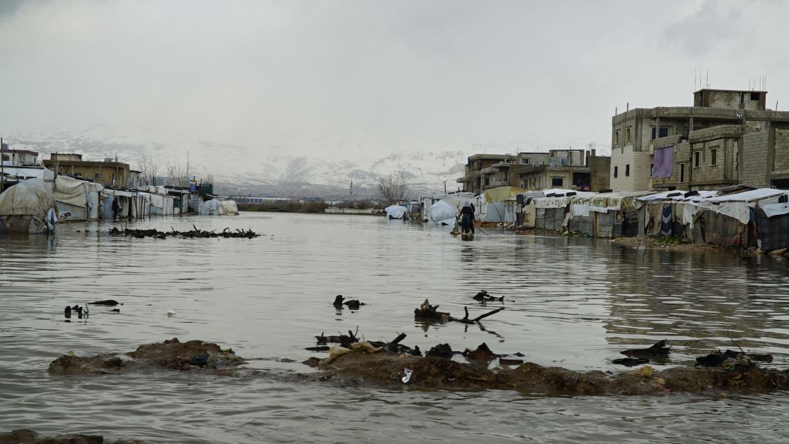 Plains, now submerged in water, separate two Syrian refugee camps in the Bar Elias area.