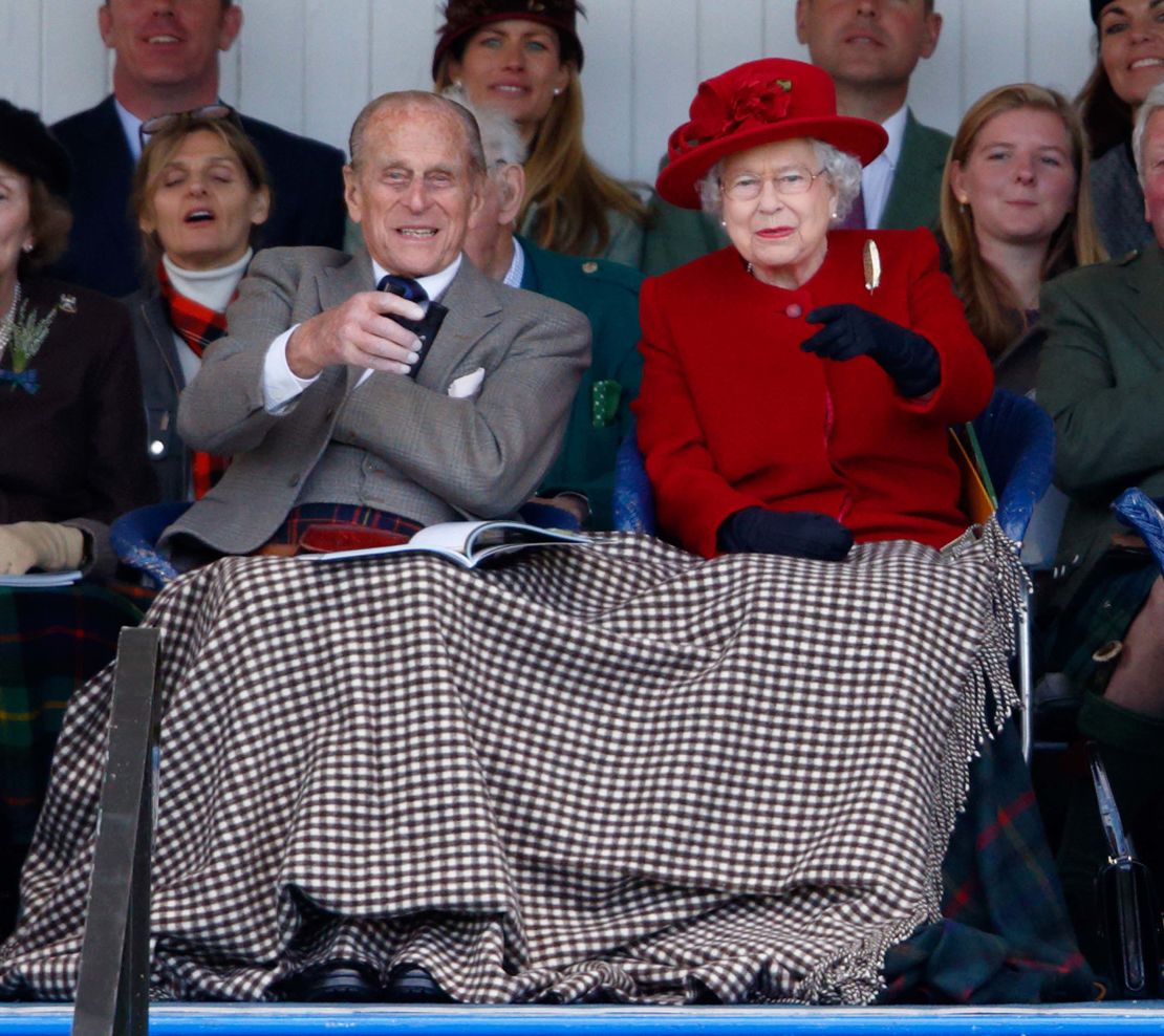 Prince Philip, Duke of Edinburgh and Queen Elizabeth II attend the Braemar Gathering, featuring Highland Games, on September 5, 2015 in Braemar, Scotland.