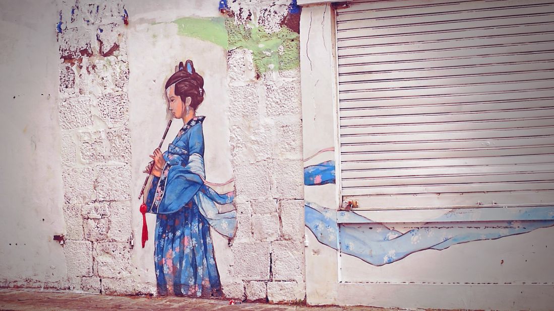 Street art in Chinatown in Mauritius. The area is now mostly a center for trade rather than living. It's a problem that is being seen elsewhere in the world from Washington and San Francisco's Chinatown to Cuba, in Havana's Barrio Chino, one of the oldest and largest Chinatown districts in Latin America that now famously contains very little Chinese, according to the <a href="http://www.Visitcuba.Com/2012/10/havanas-chinatown-barrio-chino-de-la-habana/" target="_blank" target="_blank">Visit Cuba</a> website. 