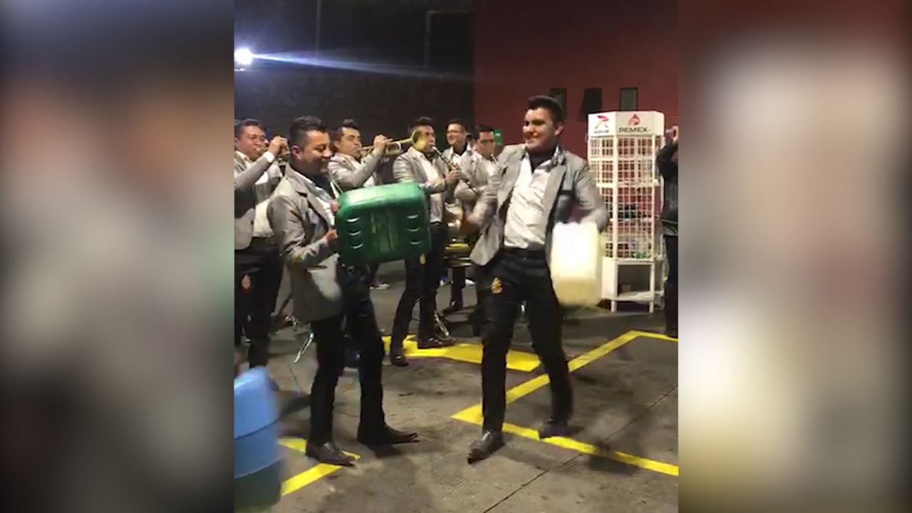 A band in the Mexican state of Michoacan posted a video online of their performance at a gas station during the fuel shortage.