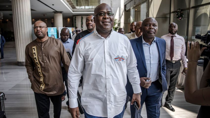 Presidential candidate Felix Tshisekedi (C) arrives for a meeting between CENI, SADC and other presidential candidates in Kinshasa on December 29, 2018, one day ahead of the general elections. (Photo by Luis TATO / AFP)        (Photo credit should read LUIS TATO/AFP/Getty Images)