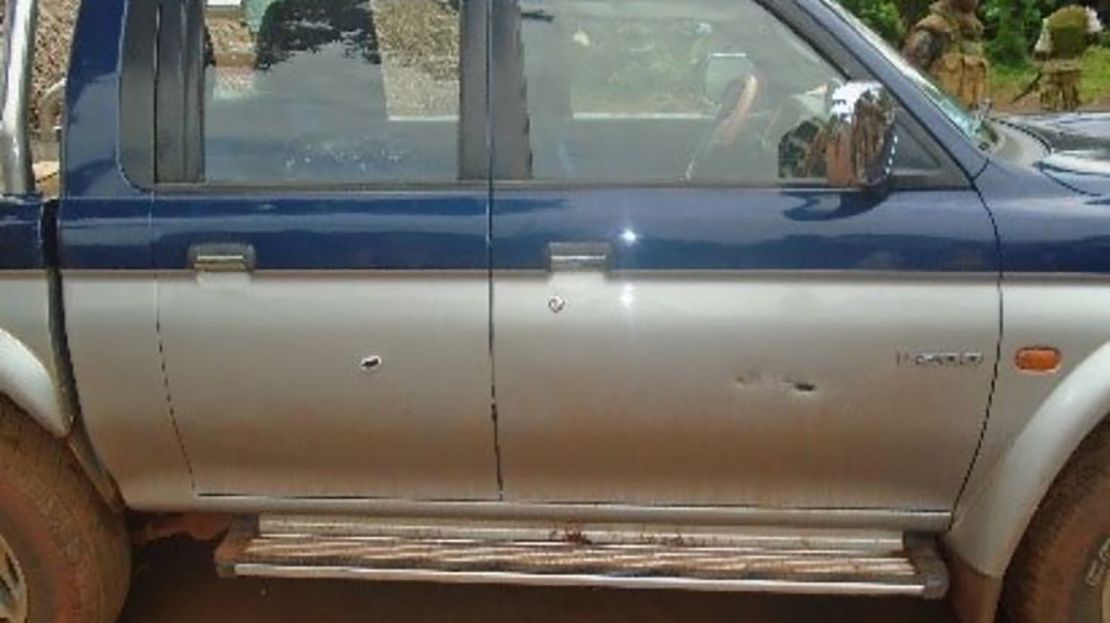 Bullet holes in the side of the vehicle carrying the Russian journalists.