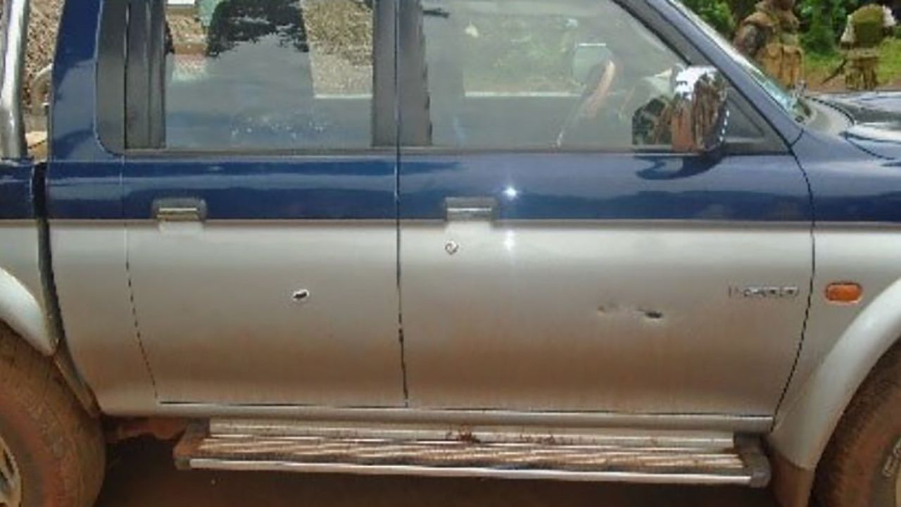 Bullet holes in the side of the vehicle carrying the Russian journalists.