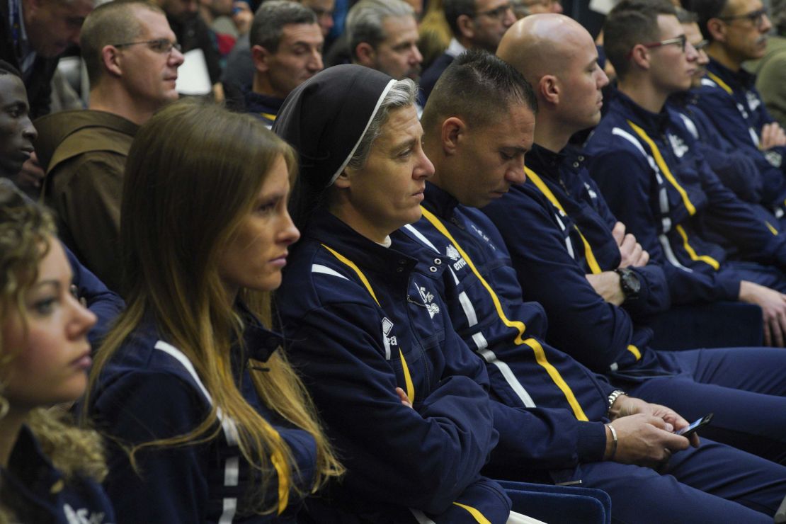 Sister Marie Theo, third from left, sits among other members of the Athletica Vaticana sports team at a press conference on Thursday, January 10.