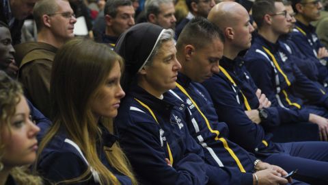 Sister Marie Theo, third from left, sits among other members of the Athletica Vaticana sports team at a press conference on Thursday, January 10.