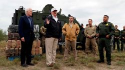 President Donald Trump speaks as tours the U.S. border with Mexico at the Rio Grande on the southern border, Thursday, Jan. 10, 2019, in McAllen, Texas, as Sen. John Cornyn, R-Texas, left, and Sen. Ted Cruz, R-Texas, listen. (AP Photo/ Evan Vucci)