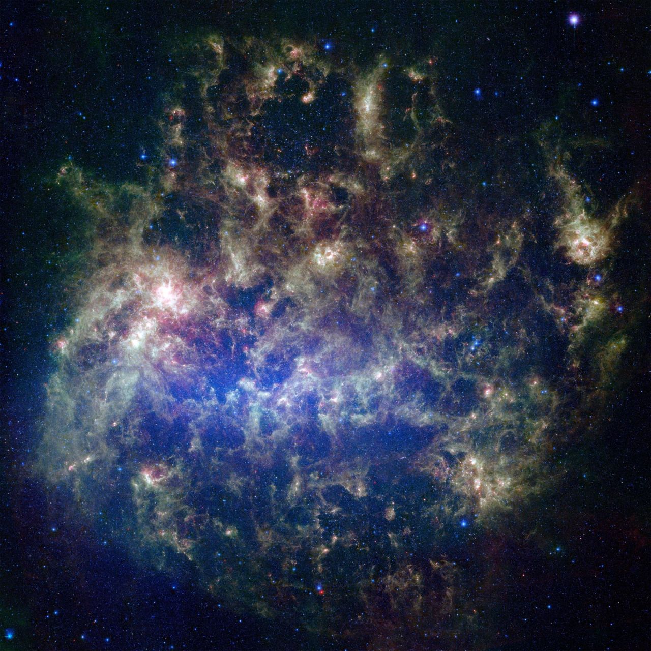 NASA's Spitzer Space Telescope captured this image of the Large Magellanic Cloud, a satellite galaxy to our own Milky Way galaxy. Astrophysicists now believe it could collide with our galaxy in two billion years.