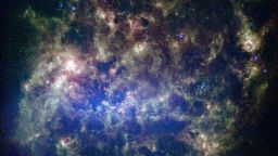 This vibrant image from NASA's Spitzer Space Telescope shows the Large Magellanic Cloud, a satellite galaxy to our own Milky Way galaxy.

