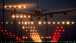 LOS ANGELES, CA - NOVEMBER 22: A jet lands at Los Angeles International Airport (LAX) on Thanksgiving eve, traditionally the busiest travel day of the year, November 22, 2006 in Los Angeles, California. The American Automobile Association (AAA) estimated 38.3 million people will travel 50 miles or more for Thanksgiving, and that 4.8 million travelers will fly to their Thanksgiving destinations. (Photo by David McNew/Getty Images)