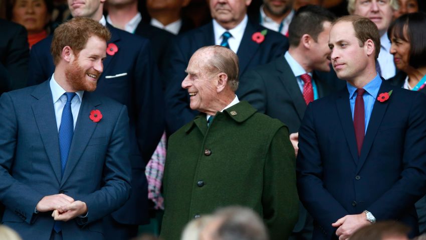 LONDON, ENGLAND - OCTOBER 31:  Prince Harry, Prince Phillip and Prince William enjoy the atmosphere during the 2015 Rugby World Cup Final match between New Zealand and Australia at Twickenham Stadium on October 31, 2015 in London, United Kingdom.  (Photo by Phil Walter/Getty Images)