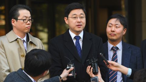 Oh Seung-hun (C), a Jehovah's Witness, speaks to the media after a court's verdict to overturn his conviction on refusing to do mandatory military service, at the supreme court in Seoul on November 1, 2018. 