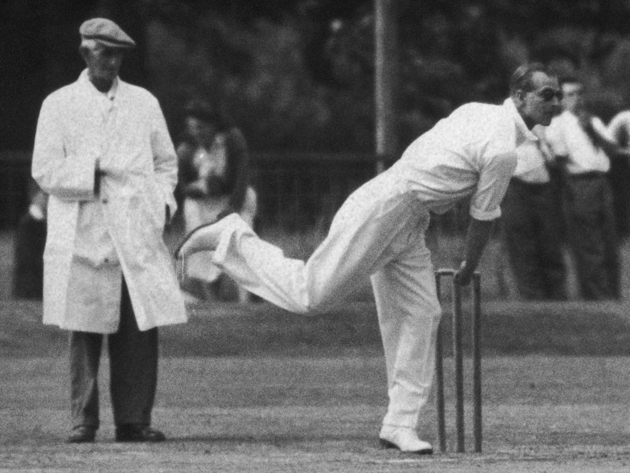 Prince Philip plays in a village cricket match in July 1949.