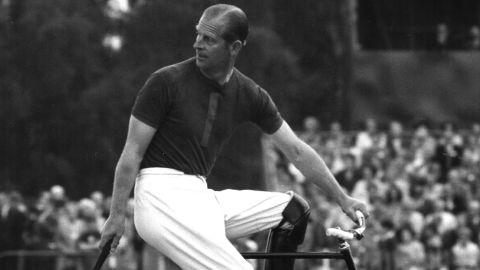Prince Philip competes in a bicycle polo match in August 1967.