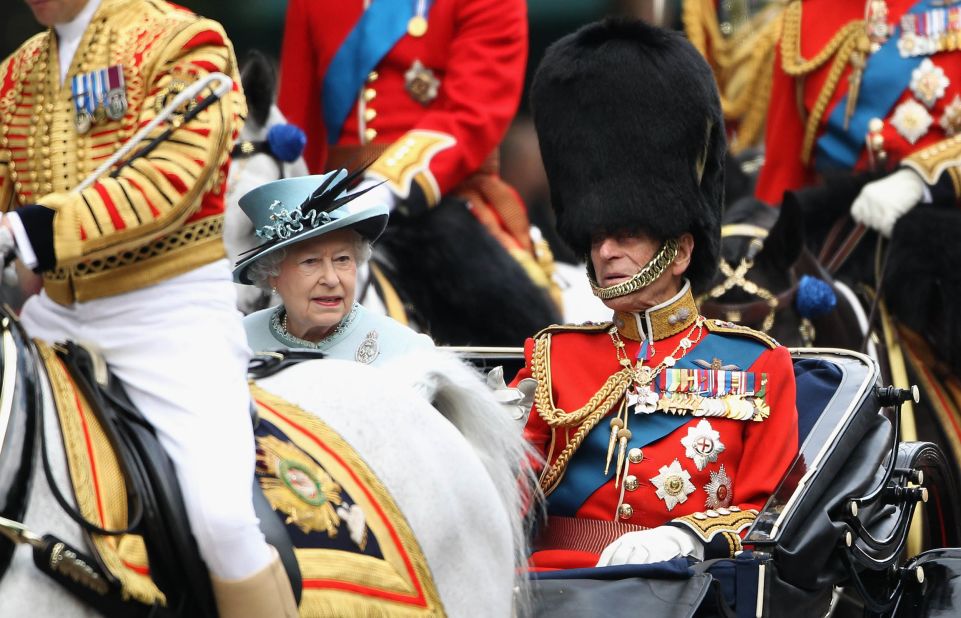 The Queen and Prince Philip attend the annual Trooping the Colour ceremony in June 2011.