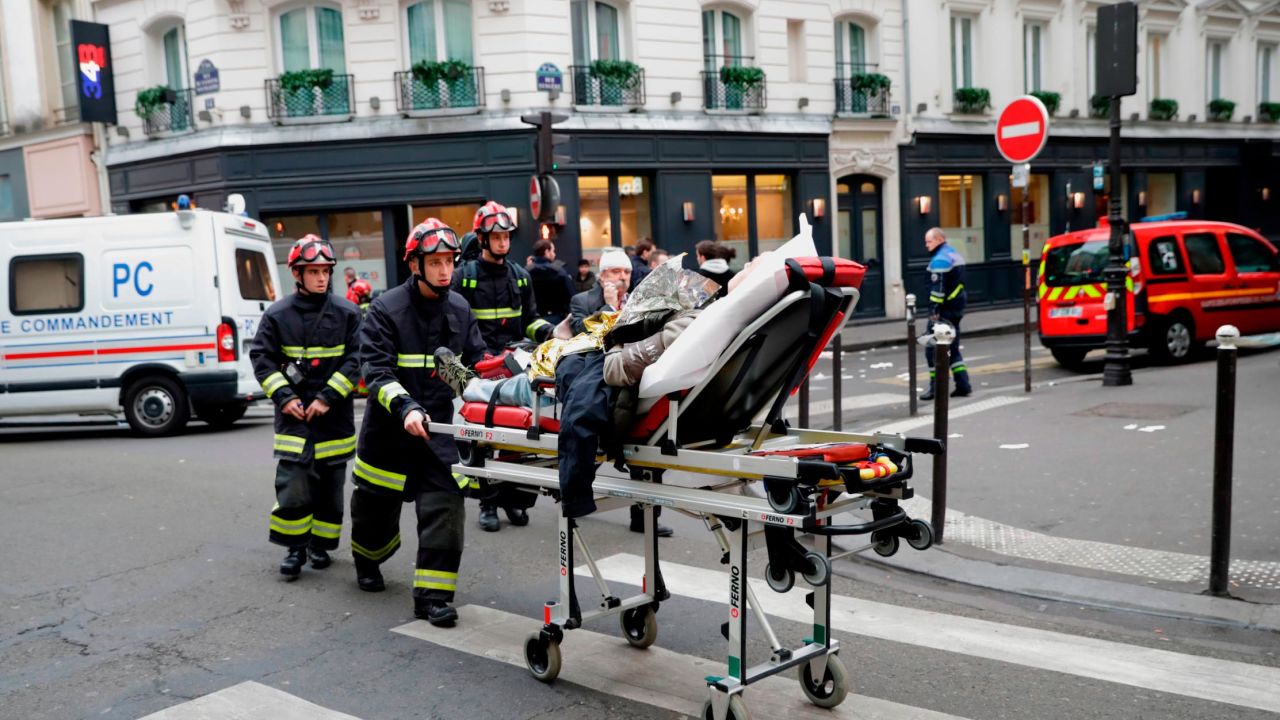 An injured person is evacuated after the blast.