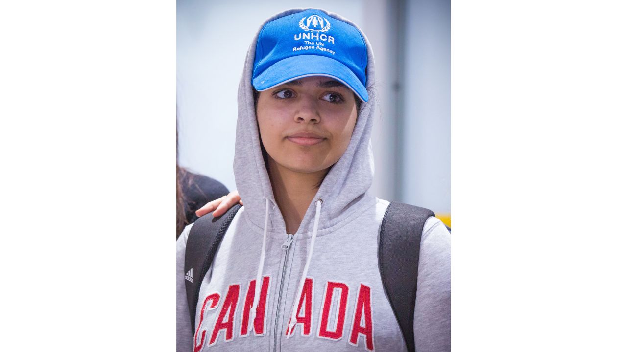 Saudi teenager Rahaf Mohammed al-Qunun arrives at Pearson International airport in Toronto, Ontario, on January 12, 2019. - The young Saudi woman who fled her family seeking asylum abroad is scheduled to land in Canada on Saturday after successfully harnessing the power of Twitter to stave off deportation from Thailand. Rahaf Mohammed al-Qunun, 18, was already en route to Toronto late Friday when Prime Minister Justin Trudeau announced that Canada would take her in. (Photo by Lars Hagberg / AFP) (Photo credit should read LARS HAGBERG/AFP/Getty Images)