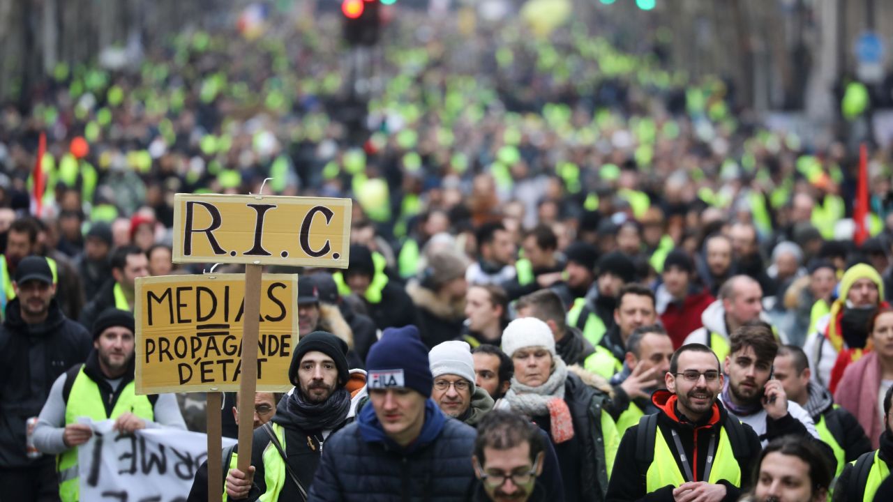 Gilets jaunes protesters march through Paris on Saturday.