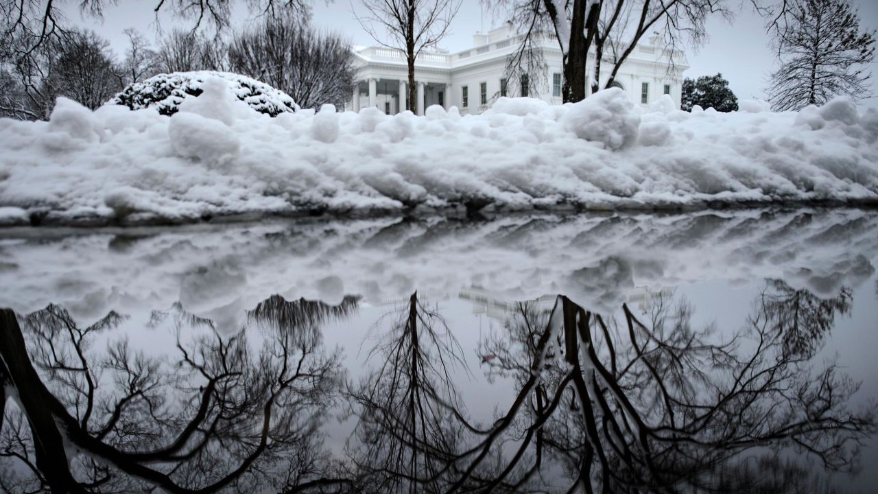 The view of the White House is obscured by a bank of snow.