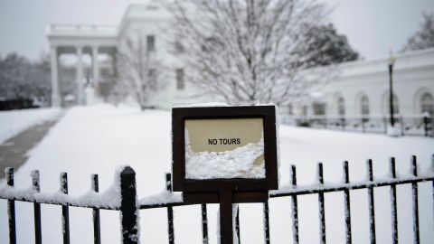 The White House looks especially wintry after a storm on Sunday, January 13.