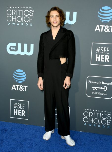 Cody Fern's dark Yohji Yamamoto jumpsuit featured a strategically placed cutout. He matched the daring outfit with a pair of white "goat" shoes by Maison Margiela. 