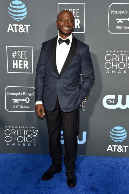 Awards host Taye Diggs arrived in a dapper tuxedo.