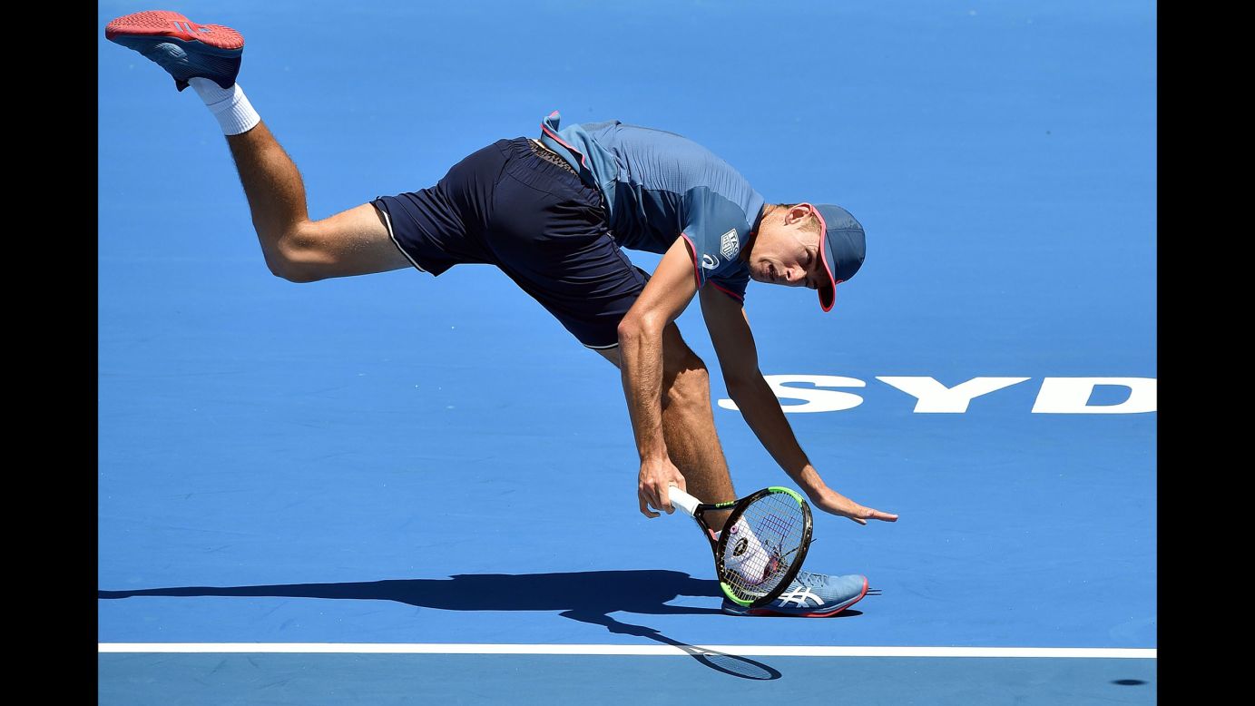 Australia's Alex De Minaur hits a return against Reilly Opelka of the United States during their men's singles second round match at the Sydney International tennis tournament on Wednesday, January 9.