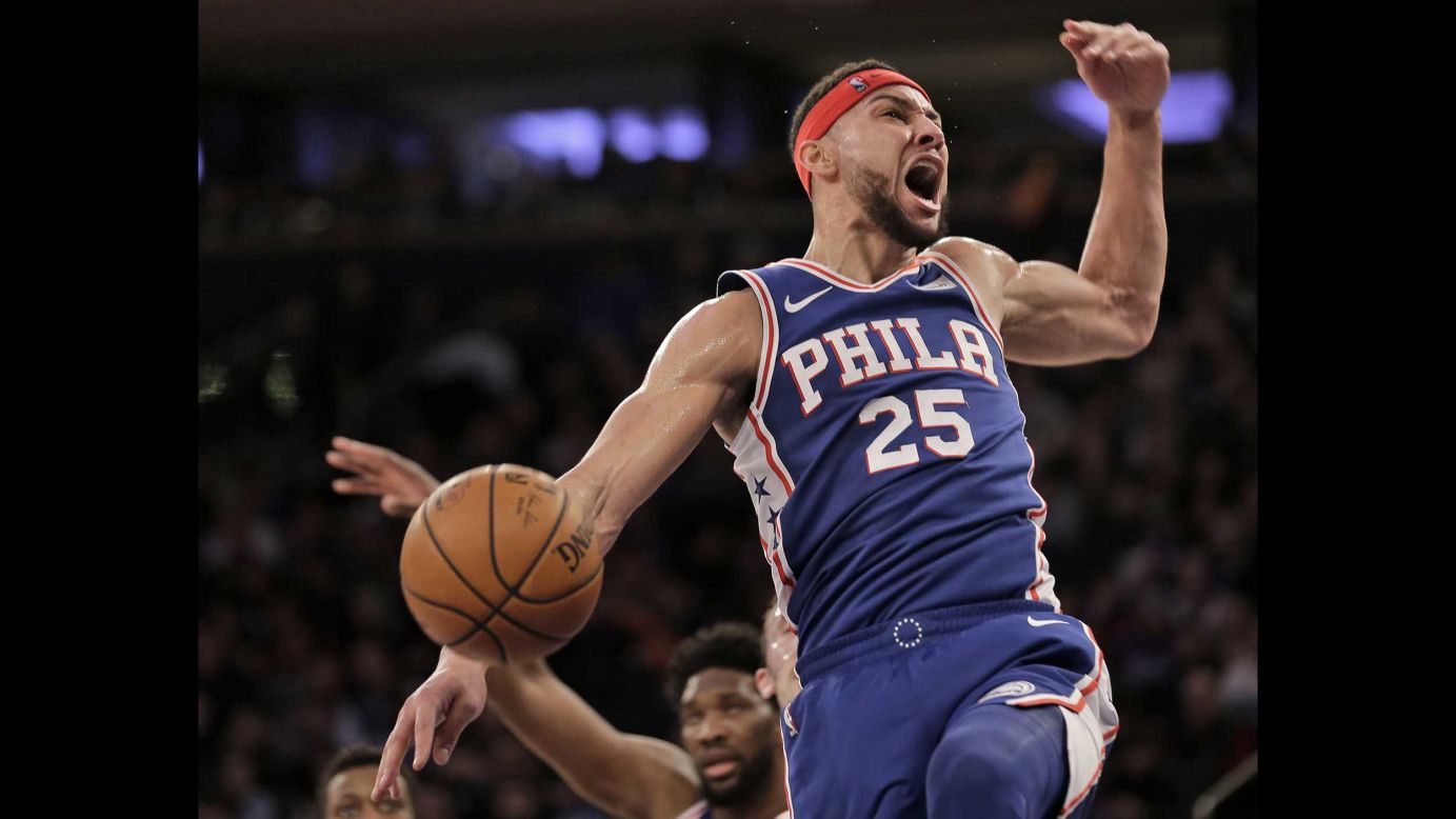 Philadelphia 76ers' Ben Simmons reacts after dunking during the first half of an NBA basketball game against the New York Knicks in New York on January 13.