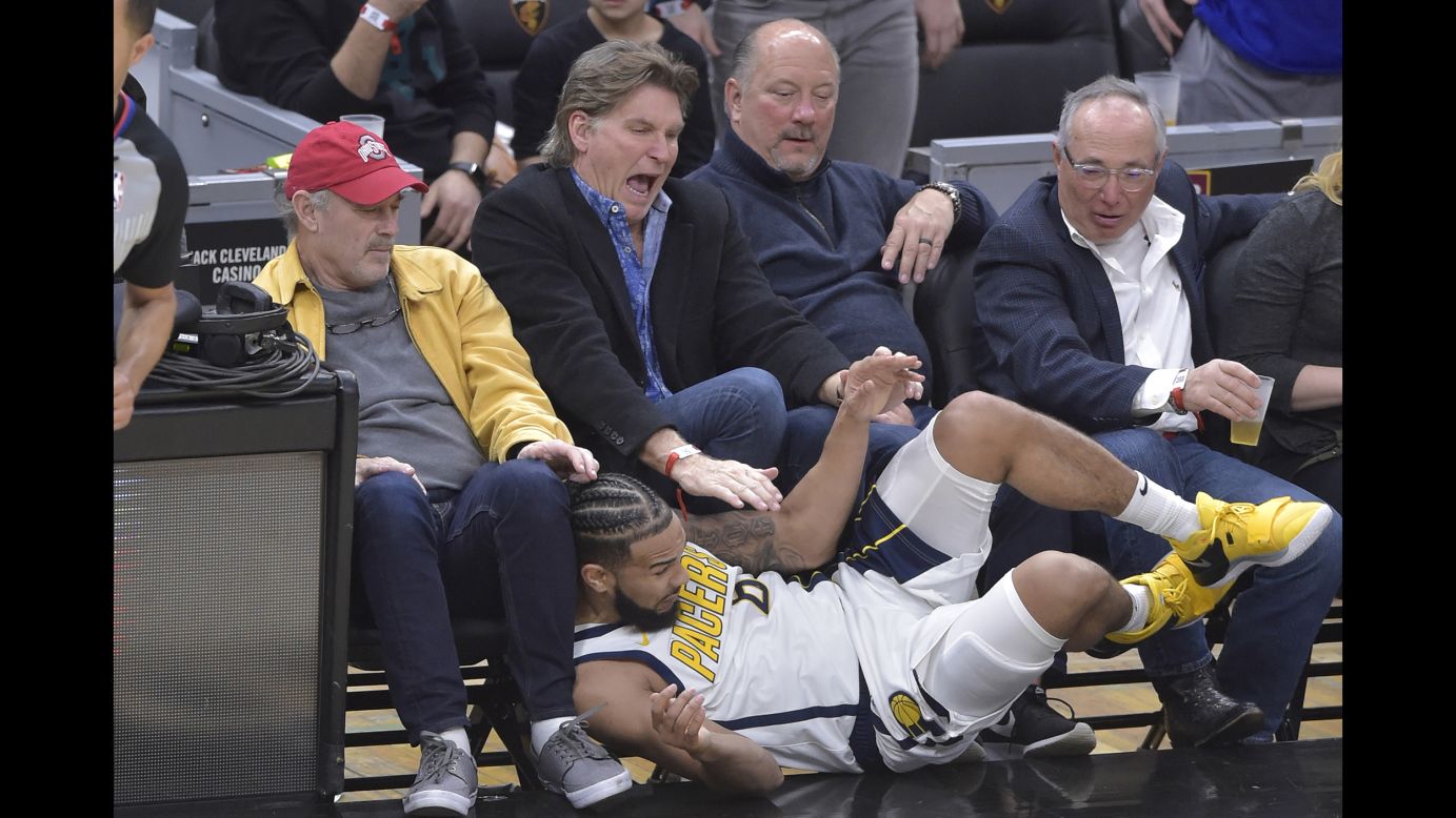 Fans react as Indiana Pacers guard Cory Joseph slides off the court in the fourth quarter against the Cleveland Cavaliers at Quicken Loans Arena in Cleveland on January 8.