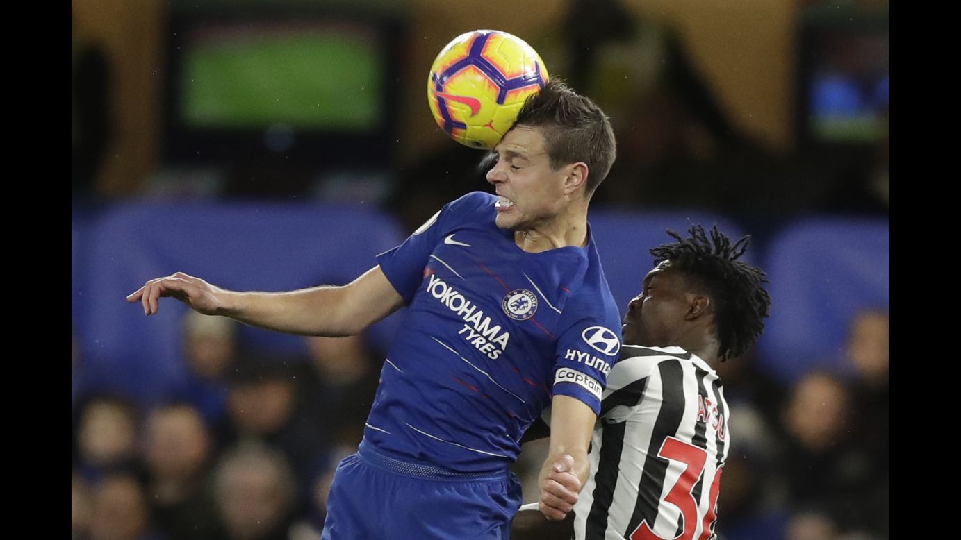 Chelsea's Cesar Azpilicueta, left, and Newcastle United's Christian Atsu go for a header during the English Premier League soccer match between Chelsea and Newcastle United at Stamford Bridge stadium in London on January 12.
