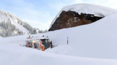 A snow blower attempts to clear a path in Lofer, Austria.