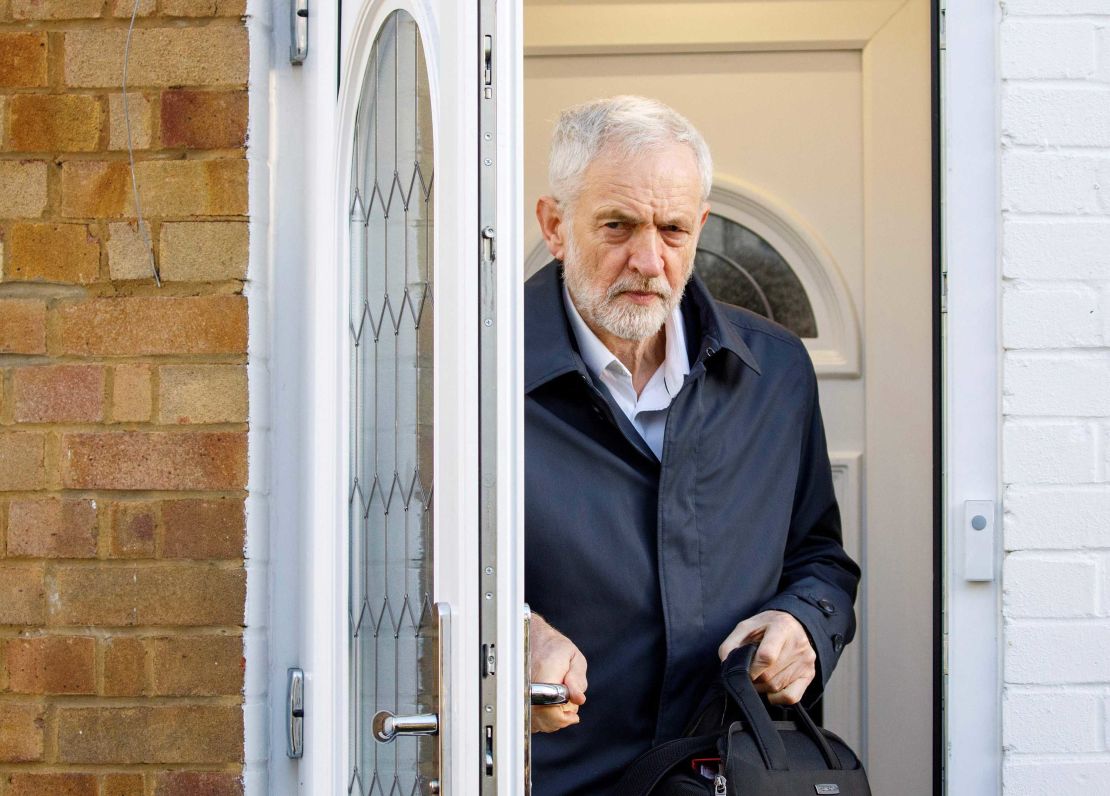 Britain's main opposition Labour Party leader Jeremy Corbyn leaves his home in London.