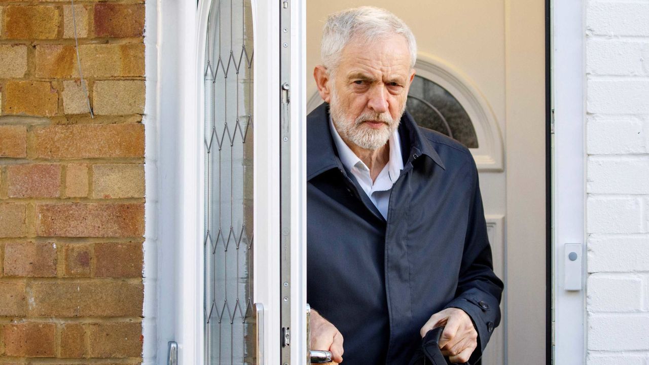 Britain's main opposition Labour Party leader Jeremy Corbyn leaves his home in London.