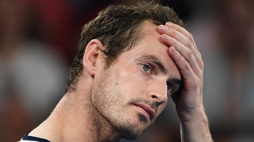 TOPSHOT - Britain's Andy Murray reacts during an interview after his defeat against Spain's Roberto Bautista Agut during their men's singles match on day one of the Australian Open tennis tournament in Melbourne on January 14, 2019. (Photo by SAEED KHAN / AFP) / -- IMAGE RESTRICTED TO EDITORIAL USE - STRICTLY NO COMMERCIAL USE --        (Photo credit should read SAEED KHAN/AFP/Getty Images)