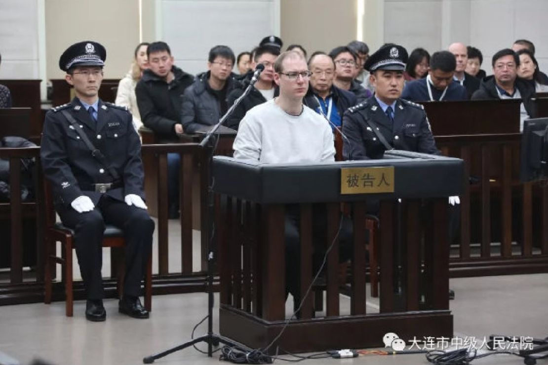 Robert Lloyd Schellenberg, photographed in Dalian Intermediate People's Court. 
