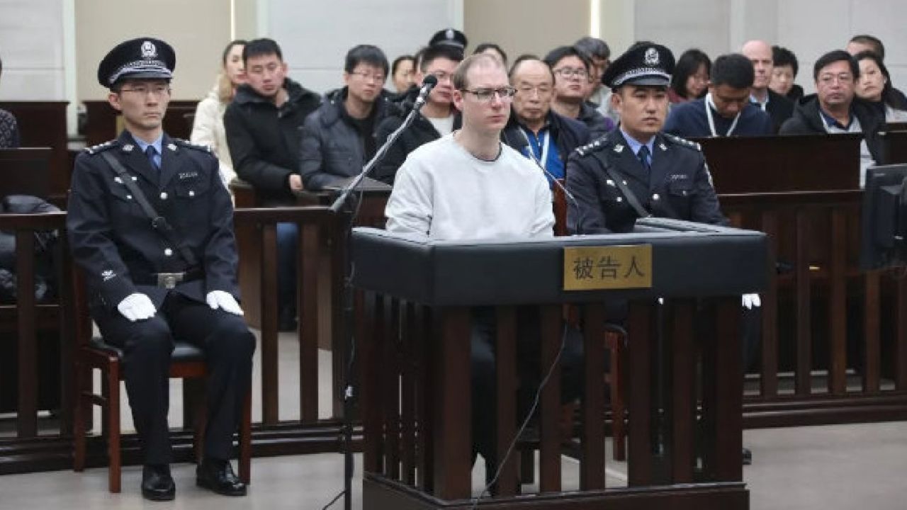 Robert Lloyd Schellenberg, photographed in Dalian Intermediate People's Court.