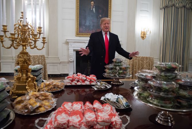Trump displays <a href="index.php?page=&url=https%3A%2F%2Fwww.cnn.com%2F2019%2F01%2F14%2Fpolitics%2Fdonald-trump-clemson-food%2Findex.html" target="_blank">fast food </a>for Clemson University's football team to celebrate its national championship at the White House on January 14. The administration said Trump paid for the meal after much of the White House residence staff, including chefs, were furloughed.