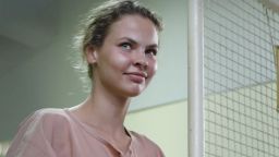 Detained Belarusian model Anastasia Vashukevich better known by her pen name Nastya Rybka, prepares to board a prison van after a court trial in Pattaya on August 20, 2018.