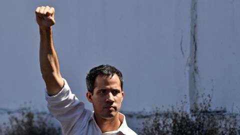 Venezuela's National Assembly president Juan Guaido gestures before a crowd of opposition supporters during an open meeting in Caraballeda, Vargas State, Venezuela, on January 13, 2019.