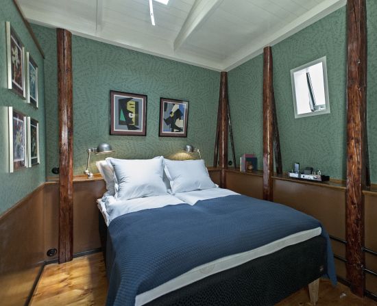 The room has a double bed and a bathroom, and is so small that the owners advise against families booking a stay.