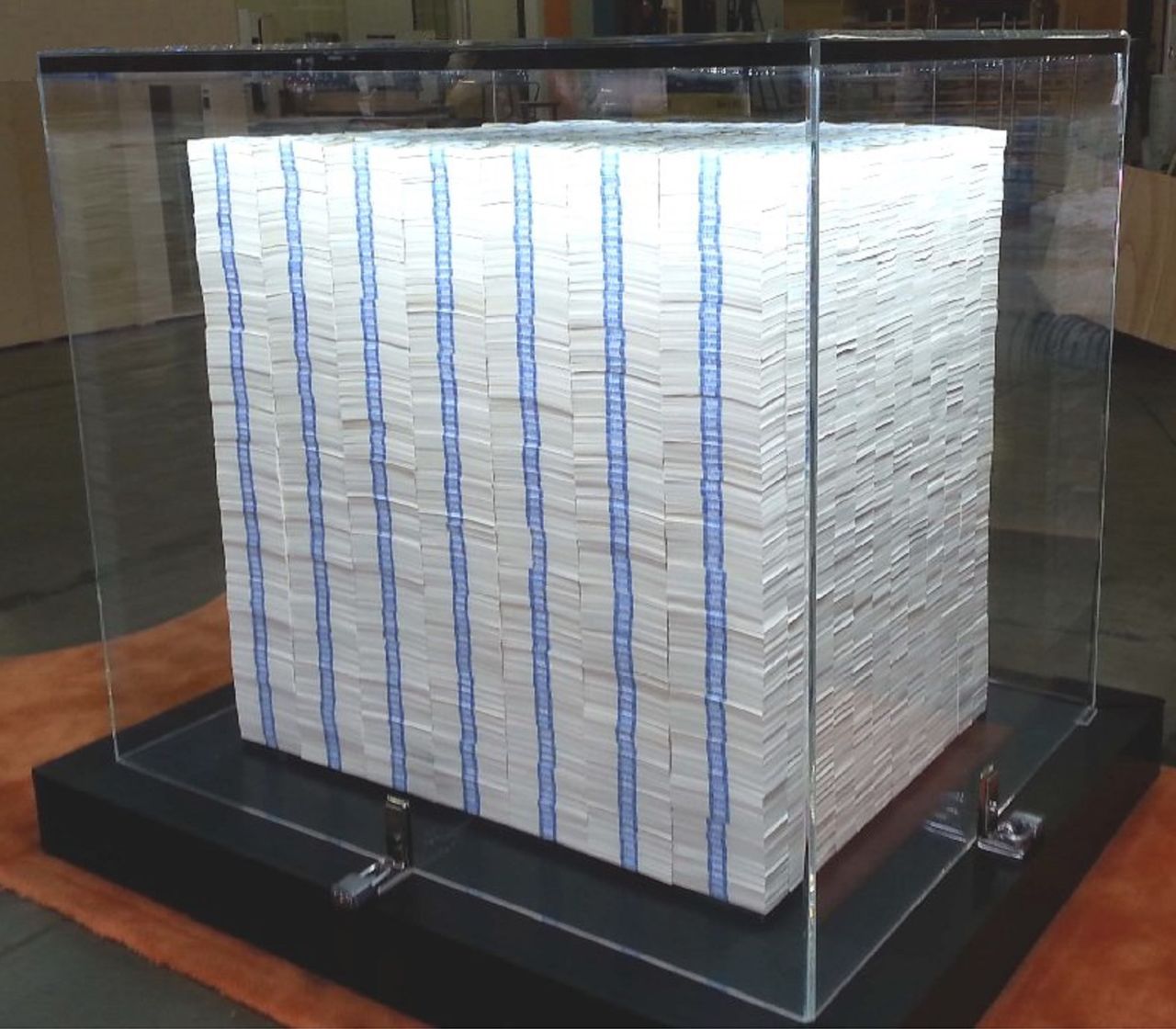 This pallet of money includes more than  3,000 stacks. It weighs 1,000 lbs.