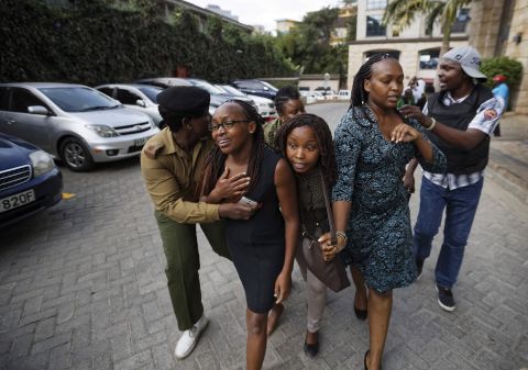 Civilians flee the scene during an attack on a hotel complex in Nairobi.