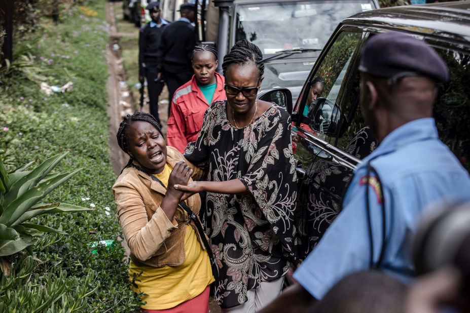 A woman is rescued on the second day ot the attack at the hotel complex in Nairobi's Westlands neighborhood on January 16.