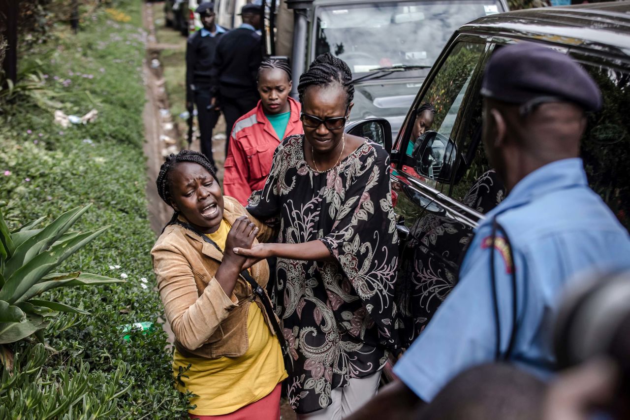 A woman is rescued on the second day ot the attack at the hotel complex in Nairobi's Westlands neighborhood on January 16.